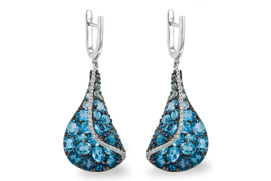 D187-50296: EARR 6.86 BLUE TOPAZ 7.05 TGW